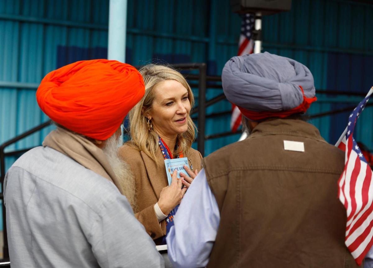 Fort Worth Mayor Mattie Parker speaks to members of the Sikhs community during the 2023 Tarrant County Veterans Day Parade in Fort Worth on Saturday.