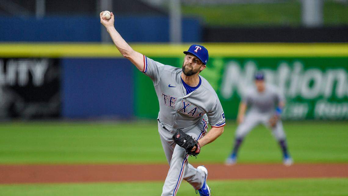 Texas Rangers starting pitcher Jordan Lyles throws to a Toronto Blue Jays batter during the first inning of a baseball game in Buffalo, N.Y., Friday, July 16, 2021. (AP Photo/Adrian Kraus)