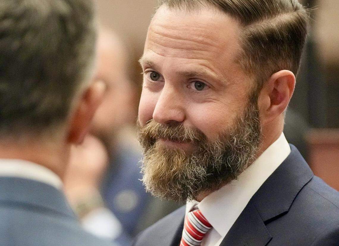 Texas House Speaker Dustin Burrows, R-Lubbock, talks to a representative after being elected on the first day of the 89th Texas Legislature at the Capitol Tuesday January 14, 2025.
