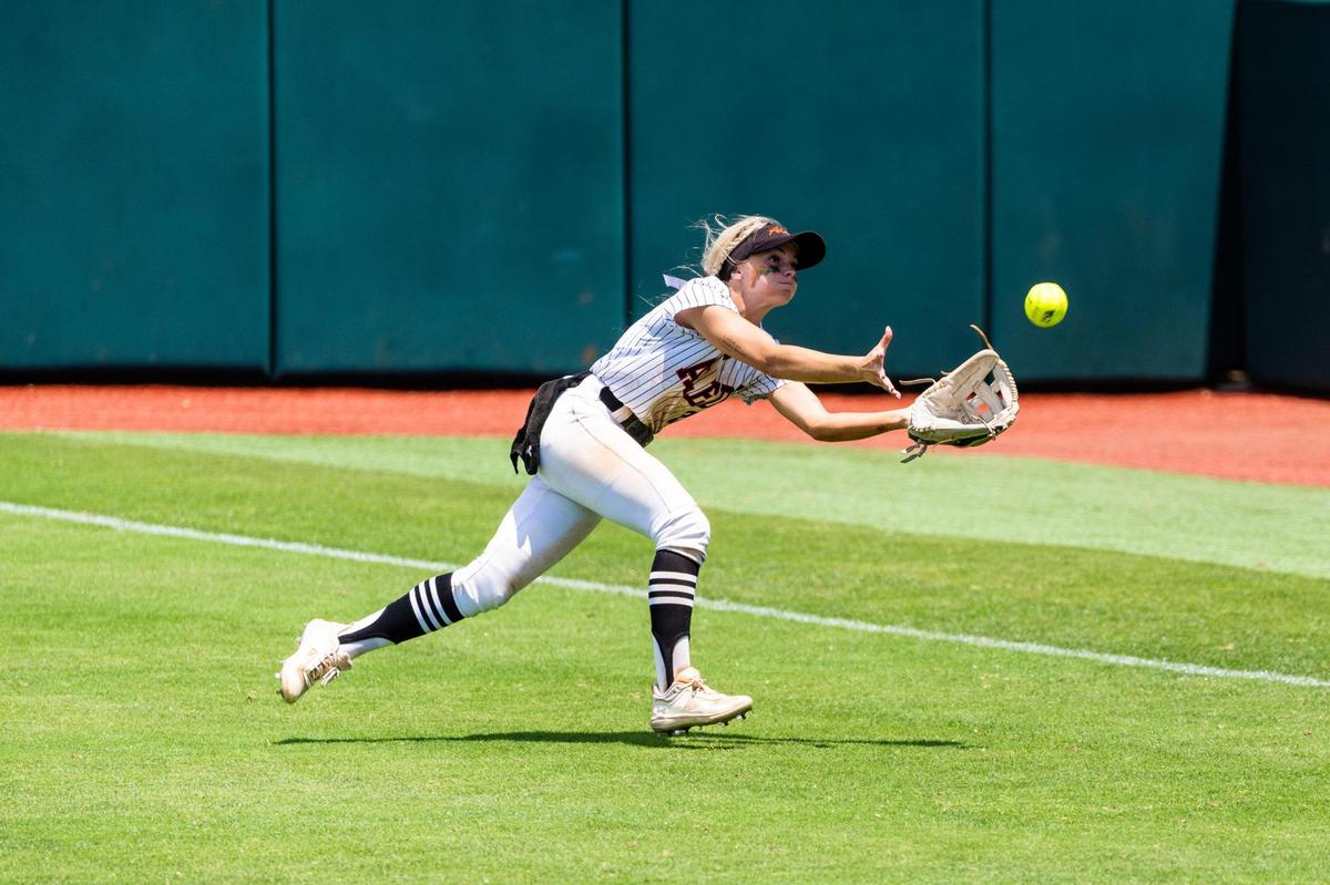 Maddy Jarvis dives in right field making the play during the 5A UIL State Softball semifinal between Aledo and Georgetown in Austin Texas, on June 3rd, 2021.
