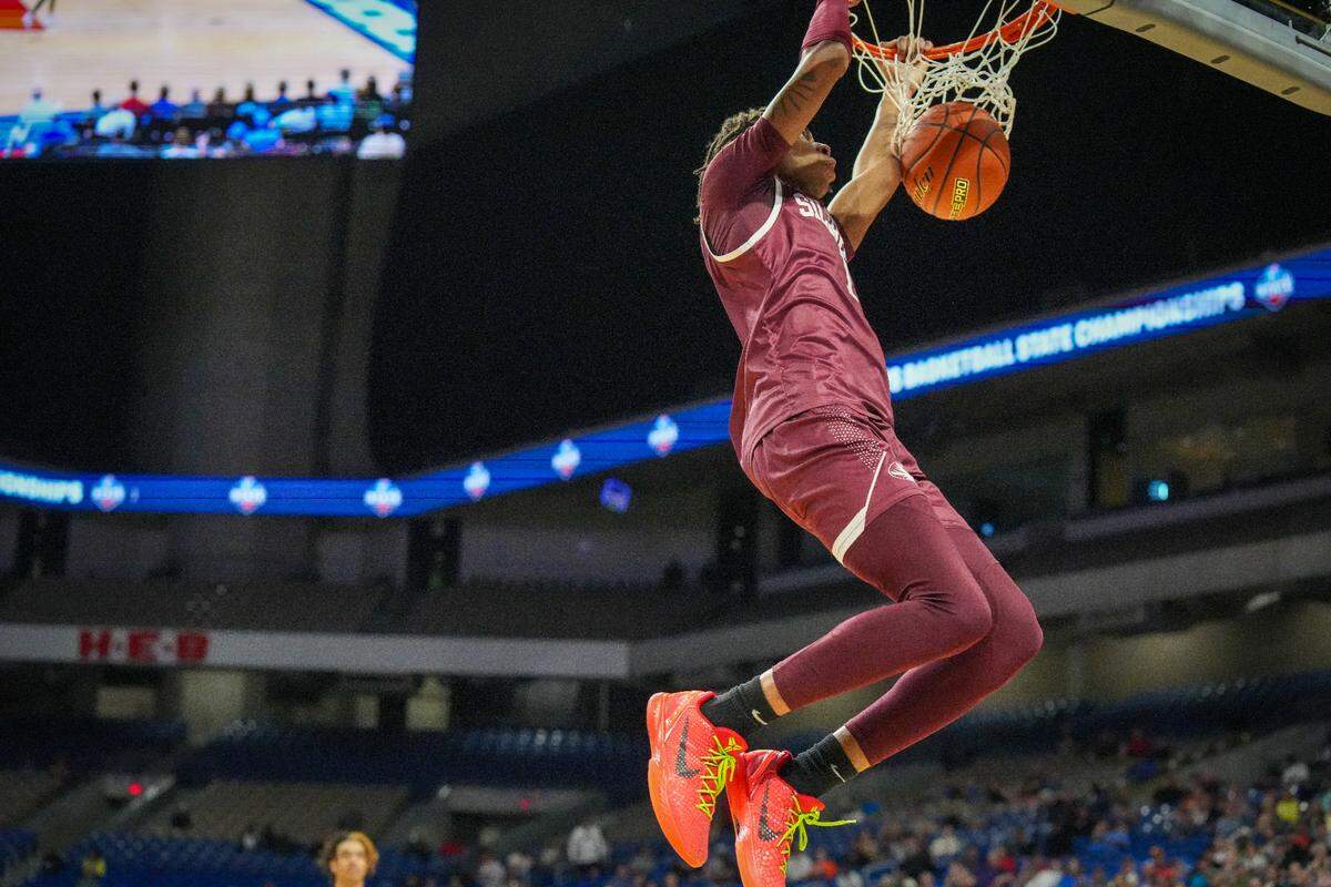 Silsbee’s Jared Harris throws down a dunk as two of his 21 points against Amarillo Randall in a Class 4A state semifinal on Friday, March 8, 2024 at the Alamodome in San Antonio, Texas. Silsbee defeated Randall 75-68.