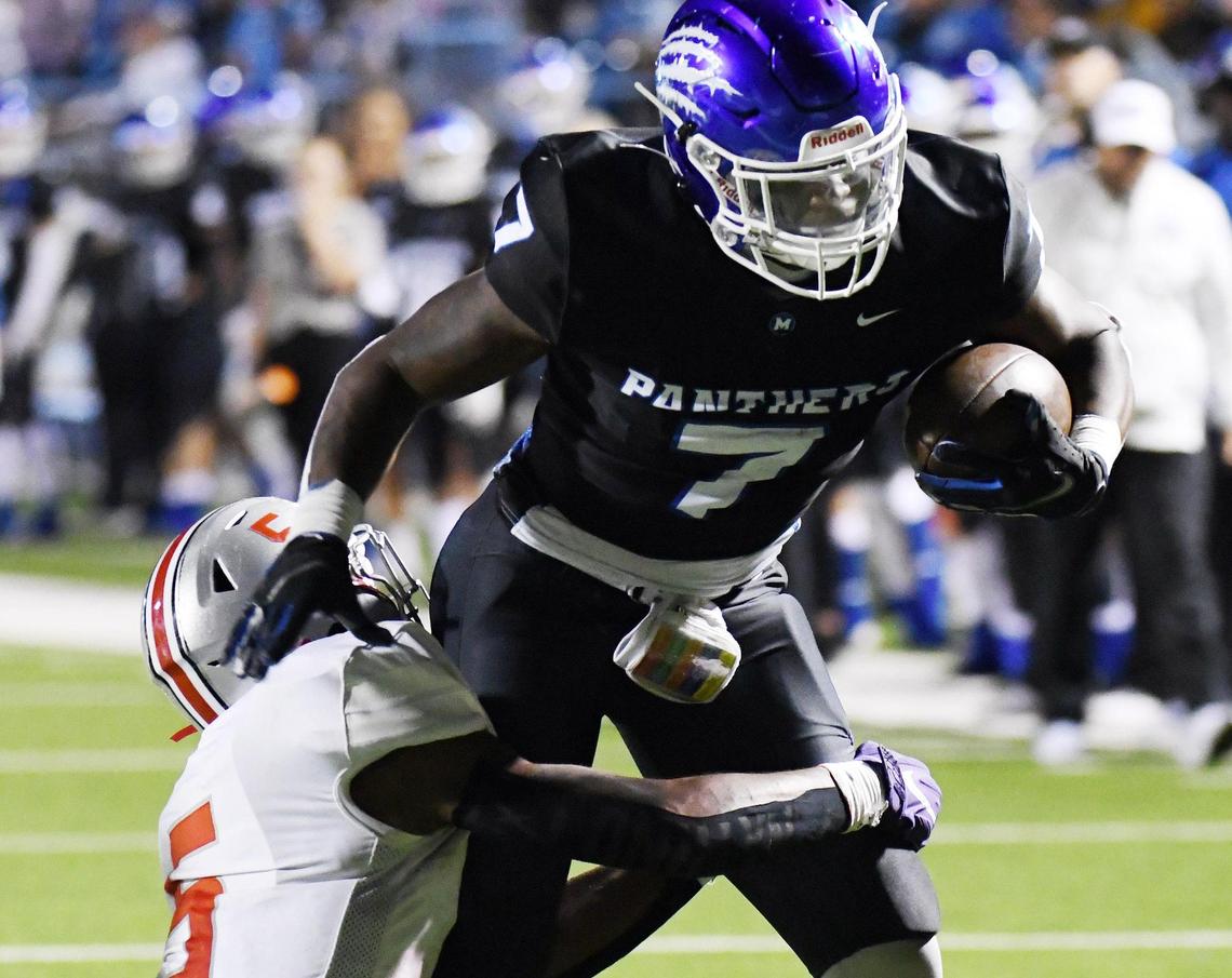 Midlothian’s De’ago Benson right gets into the endzone dragging Lake Belton’s Javeon Wilcox to score and give the Panthers a 20-16 lead in the second quarter of Friday’s October 21, 2022 District 4-5A Division 1 football game at Midlothian ISD Stadium in Midlothian, Texas. Special/Bob Haynes