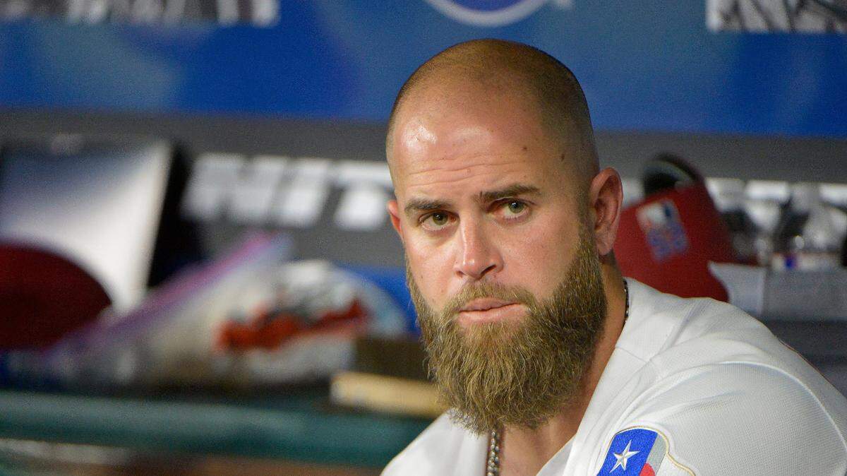 Texas Rangers designated hitter Mike Napoli (5) watching the San Diego Padres bat during the eighth inning as the Rangers beat the Padres 5-2 at Globe Life Park in Arlington, TX, Thursday, May 11, 2017.