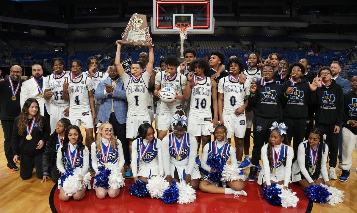 The Mansfield Summit boys basketball team poses with the Class 5A Division 2 state championship trophy after defeating Missouri City Marshall 54-47 on Saturday, March 8, 2025 at the Alamodome in San Antonio, Texas.