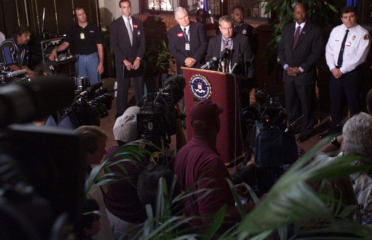 FBI Special Agent in Charge Danny A Defenbaugh talks to the media at FBI Headquarters in Dallas on Sept. 11, 2001.