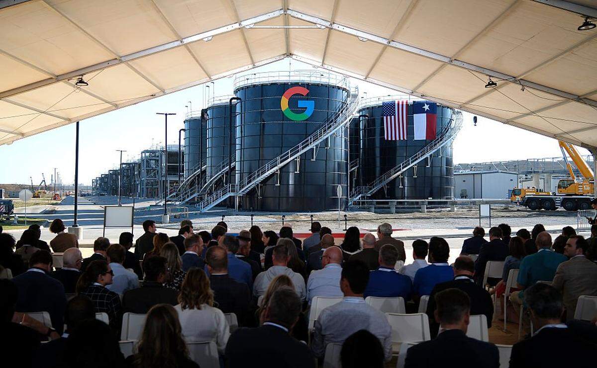 MIDLOTHIAN, TEXAS - NOVEMBER 14: Attendees await the arrival of Texas Gov. Greg Abbott and Alphabet and Google CEO Sundar Pichai at the Google Midlothian Data Center on November 14, 2025 in Midlothian, Texas. Google announced today that it plans to invest $40 billion dollars in new Texas data centers through 2027. (Photo by Ron Jenkins/Getty Images)