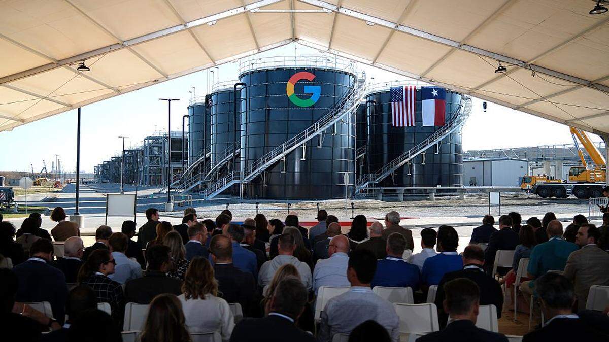 MIDLOTHIAN, TEXAS - NOVEMBER 14: Attendees await the arrival of Texas Gov. Greg Abbott and Alphabet and Google CEO Sundar Pichai at the Google Midlothian Data Center on November 14, 2025 in Midlothian, Texas. Google announced today that it plans to invest $40 billion dollars in new Texas data centers through 2027. (Photo by Ron Jenkins/Getty Images)