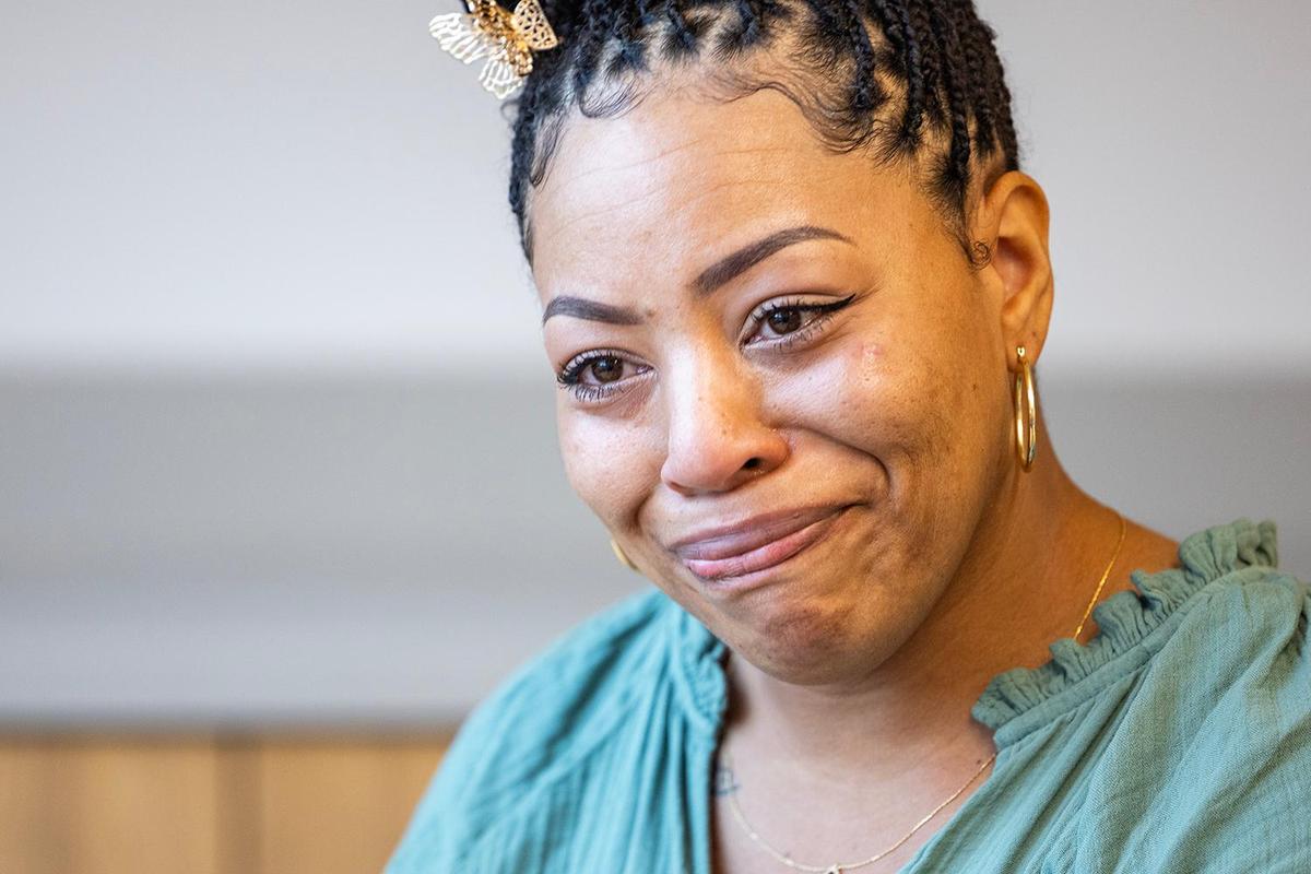 Tanisha Thomas, a client of the Center for Transforming Lives, becomes emotional talking about the challenges she had to overcome in her life. She spoke following the grand opening ceremony of the organization’s new Riverside Campus in the Morningside neighborhood of Fort Worth on Friday, May 2, 2025.