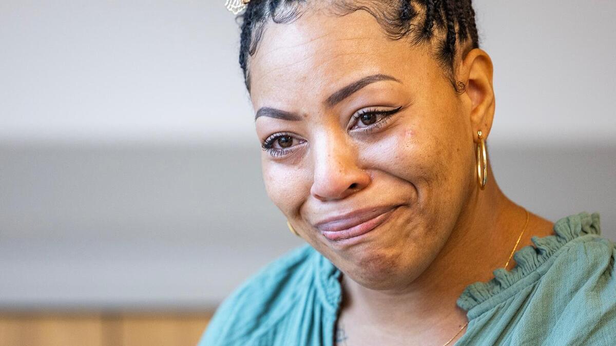 Tanisha Thomas, a client of the Center for Transforming Lives, becomes emotional talking about the challenges she had to overcome in her life. She spoke following the grand opening ceremony of the organization’s new Riverside Campus in the Morningside neighborhood of Fort Worth on Friday, May 2, 2025.