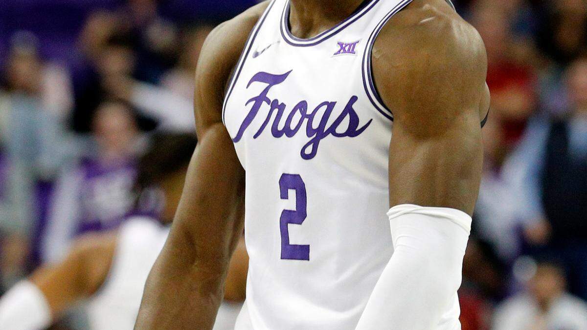 TCU forward Emanuel Miller (2) and the Frogs will be looking for a second straight upset against No. 6 Kansas on Tuesday night.