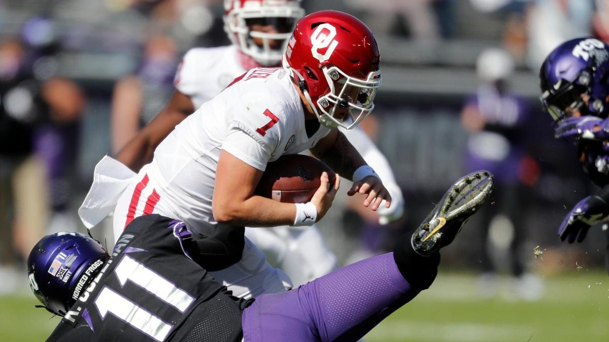 TCU defensive end Khari Coleman sacks Oklahoma quarterback Spencer Rattler during the 2020 season. The Frogs feel good about their pass rush going into 2021.