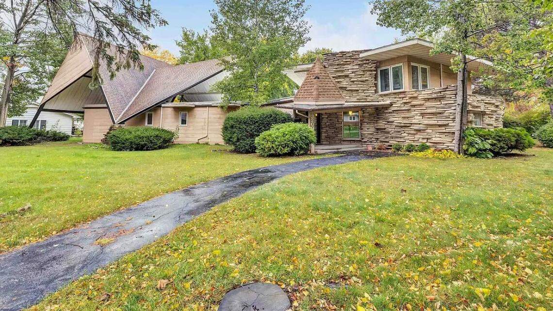 The Green Bay home has a distinct rooftop.