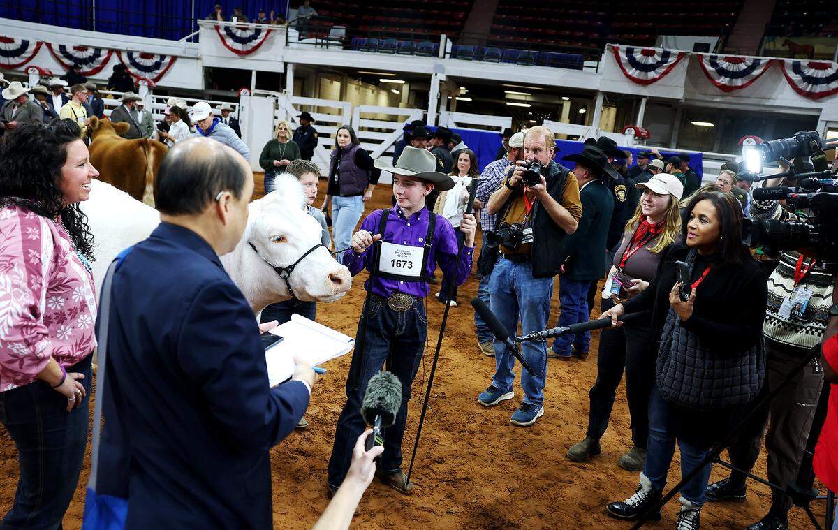 Caiman Cody of Tolar is surrounded by media after his steer White Castle was declared  the 2026 Junior Steer Show Grand Champion at the Fort Worth Stock Show & Rodeo on Friday, Feb. 6, 2026.