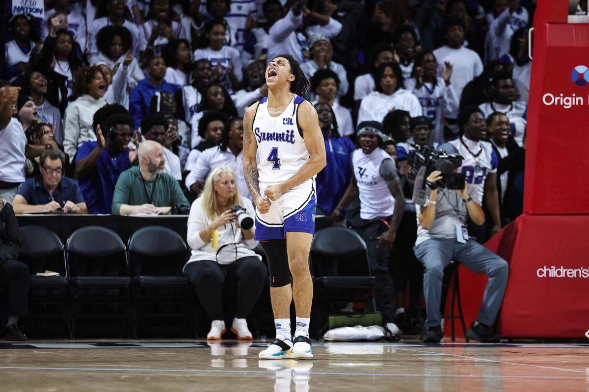 Mansfield Summit guard Jaxon Sneed (4) screams in celebration after forcing a turnover during a Class 5A Division II state semifinal against Lucas Lovejoy on Tuesday at Moody Coliseum in Dallas.
