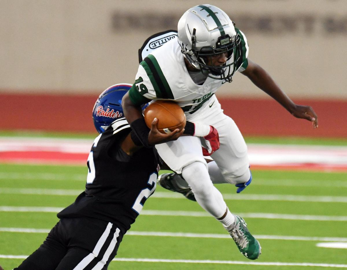 Southwest’s Martavious Boswell, left grabs Trimble Tech’s Terry Starks as he tries to get out of the backfield in the first quarter of Thursday’s September 29, 2022 District 4-5A Division2 football game at Clark Stadium in Fort Worth, Texas. Special/Bob Haynes