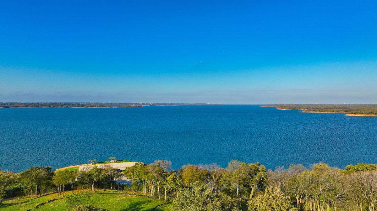 The view of Lake Grapevine from Thirty-One Eleven Sunset, a 16-story, 207-unit luxury residential apartment tower in Flower Mound. 