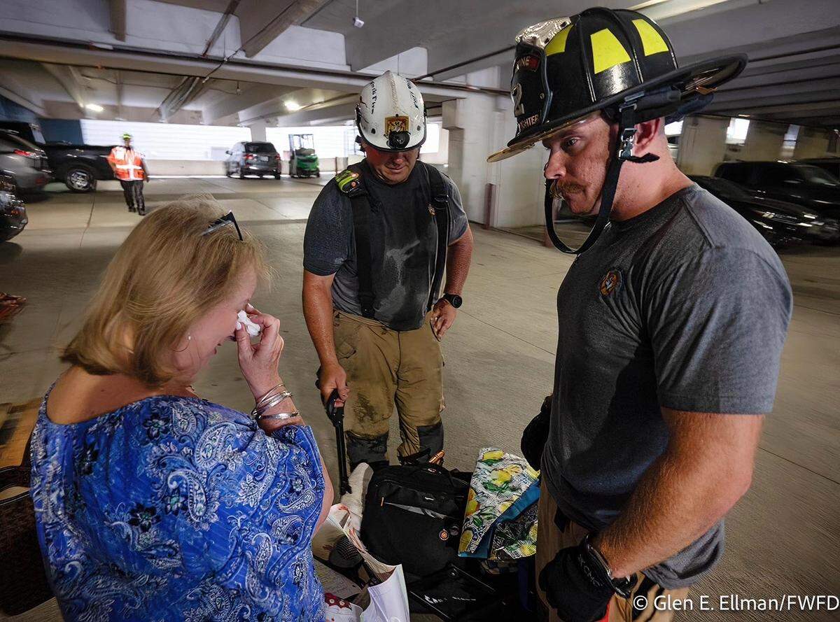 Fort Worth firefighters helped collect personal items on Monday, June 30, for residents displaced by the June 23 fire at The Cooper apartments on West Rosedale Street.