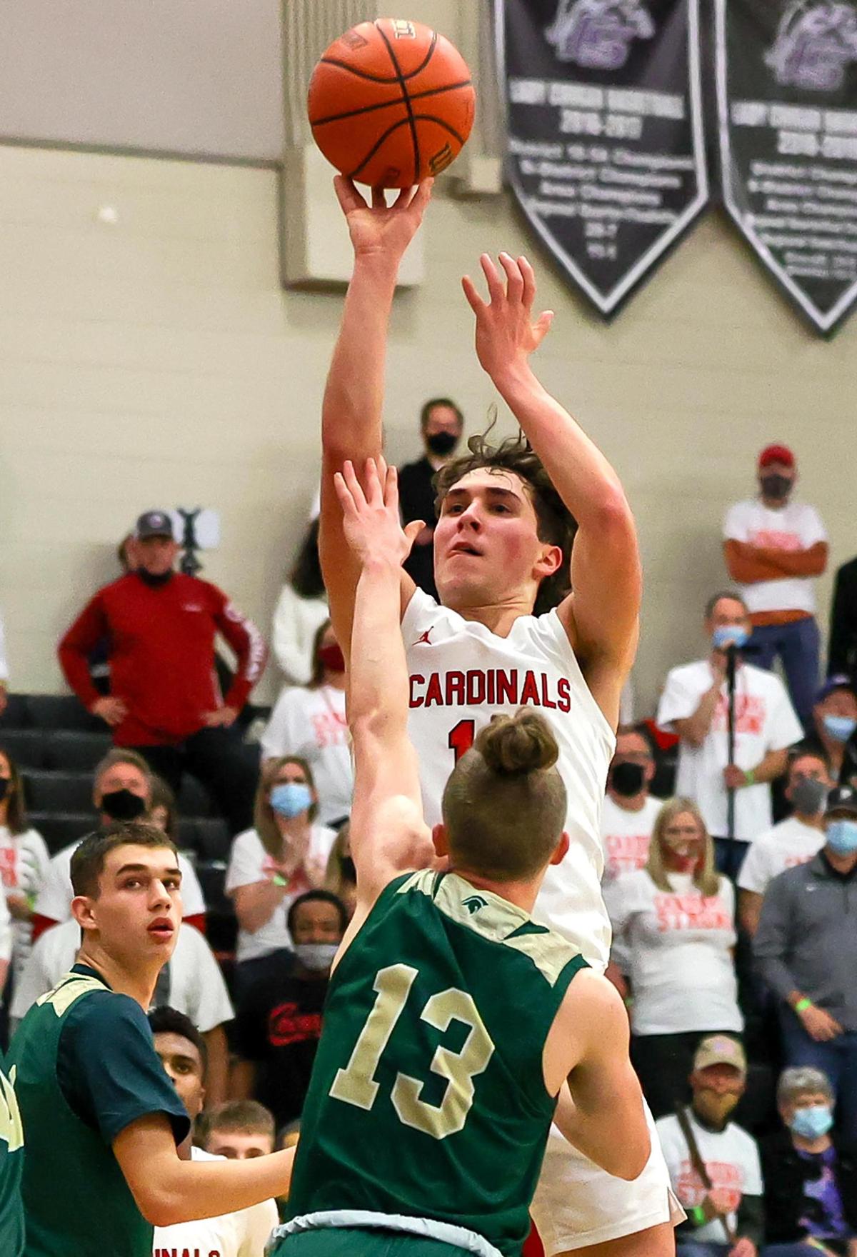 Fort Worth Christian guard Alex Bossinakis shoots over The Woodlands Christian Academy guard Austin Benigni (13) during the second half of the 5A TAPPS Boys Basketball State Championship game played on March 12, 2021 at College Station High School in College Station, TX. (Steve Nurenberg Special to the Star-Telegram)