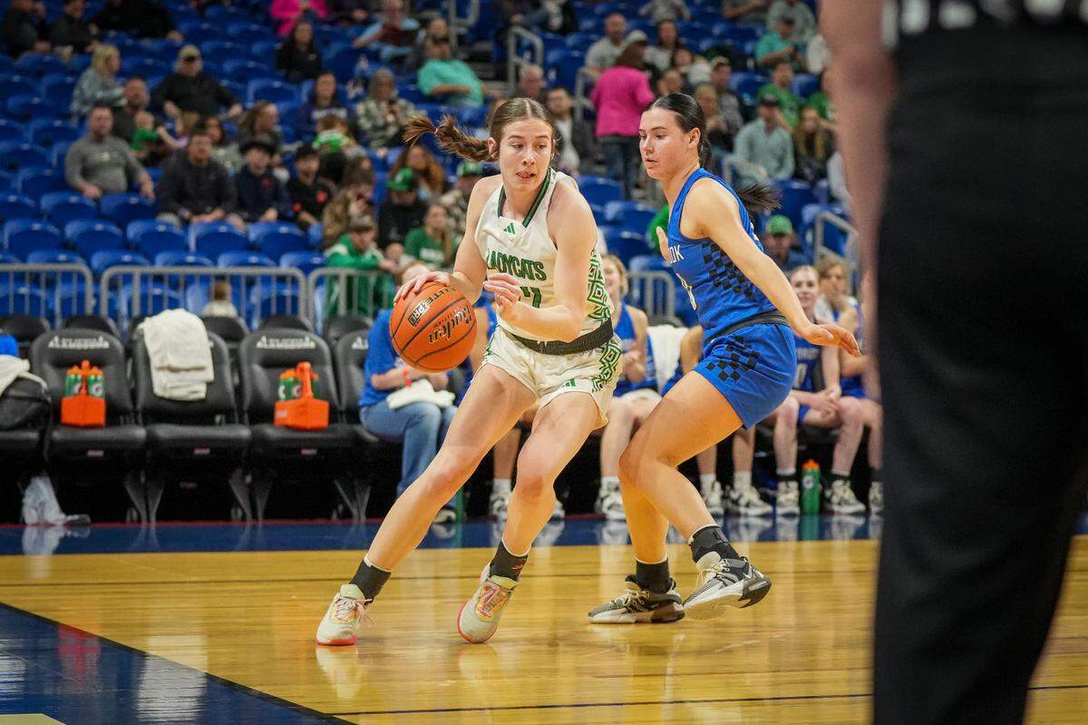 Newcastle’s Mattie Dollar drives in for two of her game-high 32 points as the Ladycats thumped Westbrook 59-37 in a Class 1A state semifinal on Thursday, February 29, 2024 at the Alamodome in San Antonio, Texas.