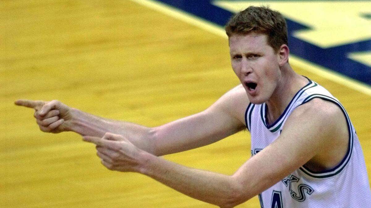Former Dallas Mavericks center Shawn Bradley was paralyzed when he was struck from behind by a vehicle while riding a bike near his Utah home.