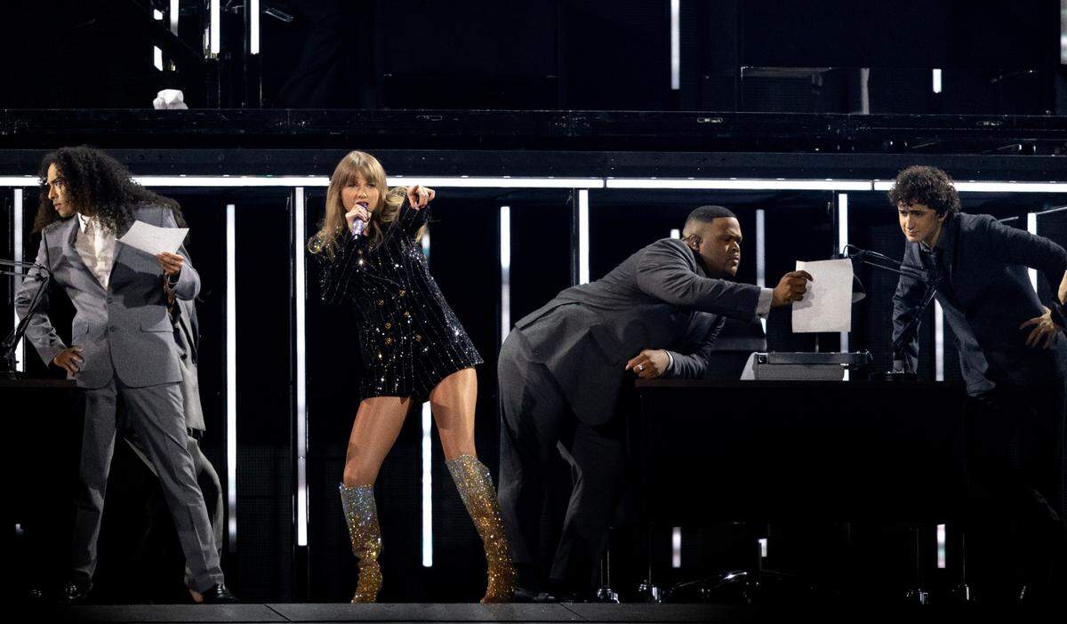 Taylor Swift performs The Man during her first sold-out concert of three nights at AT&T Stadium in Arlington on Friday, March 31, 2023.