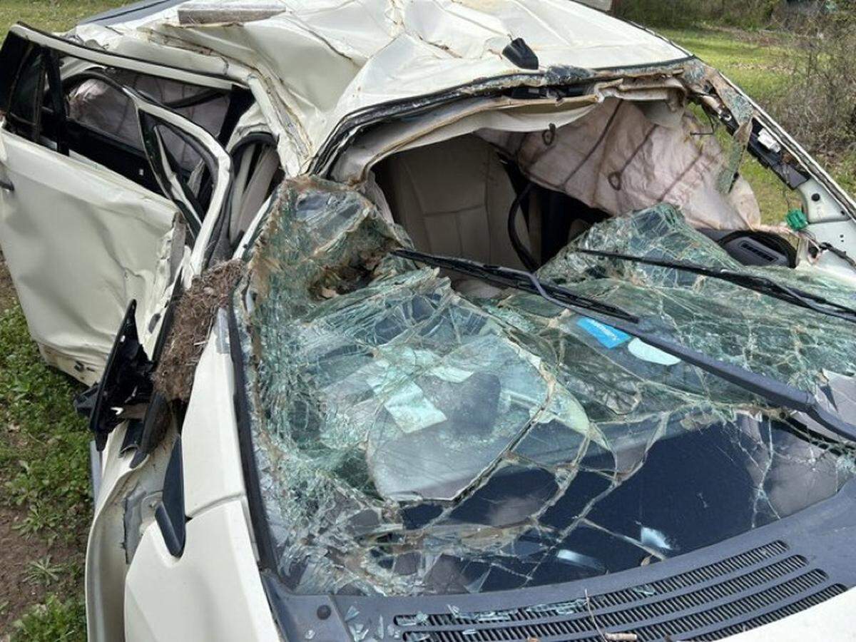 Brock Riker’s car’s passenger side is crushed following a crash on March 24, 2023.
