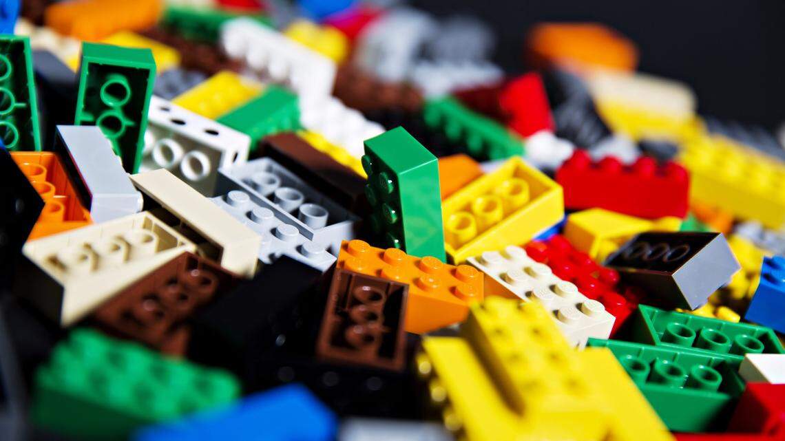A box for Lego bricks discovered during a traffic stop held lots of cash, Texas officials say. The driver was arrested.
