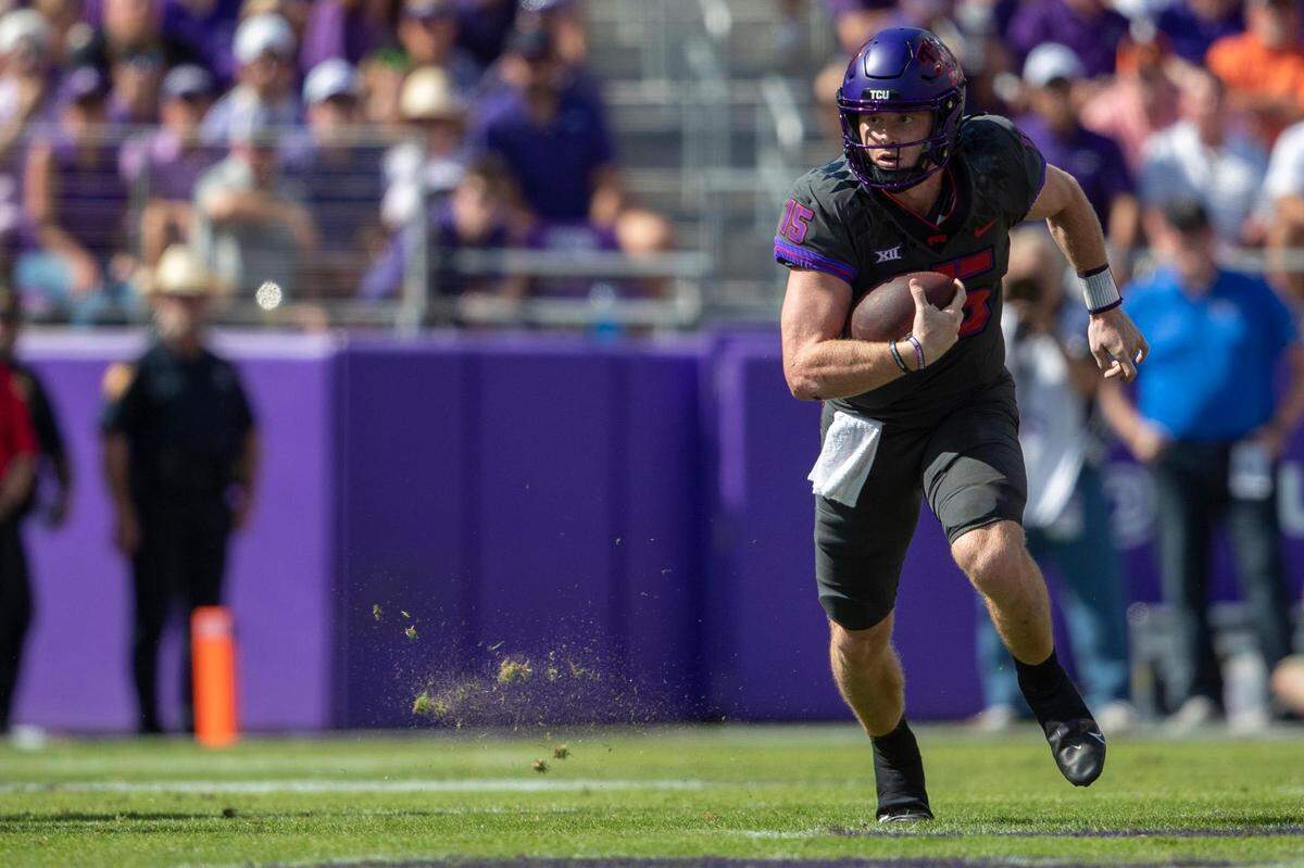 TCU quarterback Max Duggan runs the ball in their game against OSU at the Amon G. Carter Stadium in Fort Worth on Saturday, Oct. 15, 2022. The final score was 43-40.