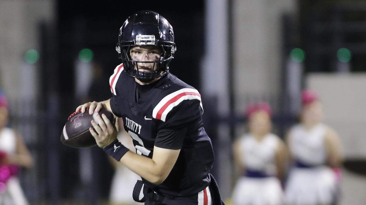 Euless Trinity’s Mack Lineweaver looks down field for a receiver against Keller during their game on Friday, October 17, 2025 at Pennington Field in Bedford, Texas.
