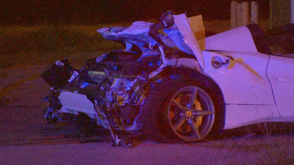 Boxer Errol Spence Jr. crashed his white Ferrari in Dallas on Oct. 10, 2019. Spence Jr. escaped major injury despite being ejected from the car during the rollover crash. He pleaded guilty to DWI last week.