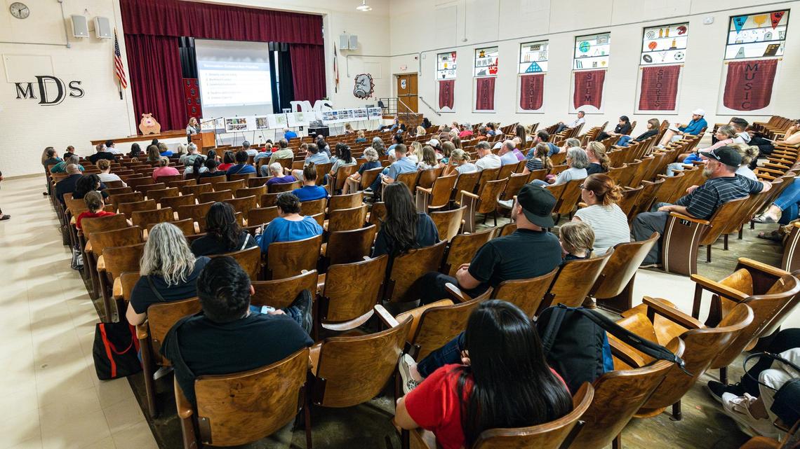 Parents, school officials and neighborhood residents gather at Daggett Middle School in Fort Worth on April 18 for a Fort Worth ISD community listening session regarding proposed school consolidations and upgrades.