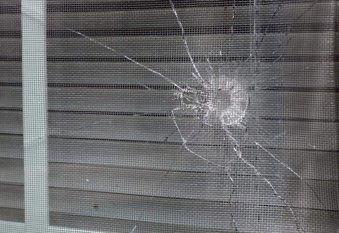 A bullet hole from the police officer’s shot is seen in the rear window of Atatiana Jefferson’s home in Fort Worth, Texas, Tuesday, Oct. 15, 2019. Jefferson, a black woman, was shot by a white police officer early Saturday, Oct. 12.