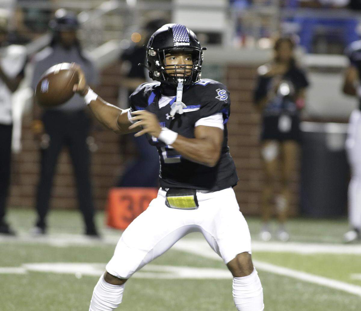 Summit’s Ian Gebhardt throws a pass against Grapevine during their game at Newsom Stadium on Thursday, Sept. 25, 2025 
