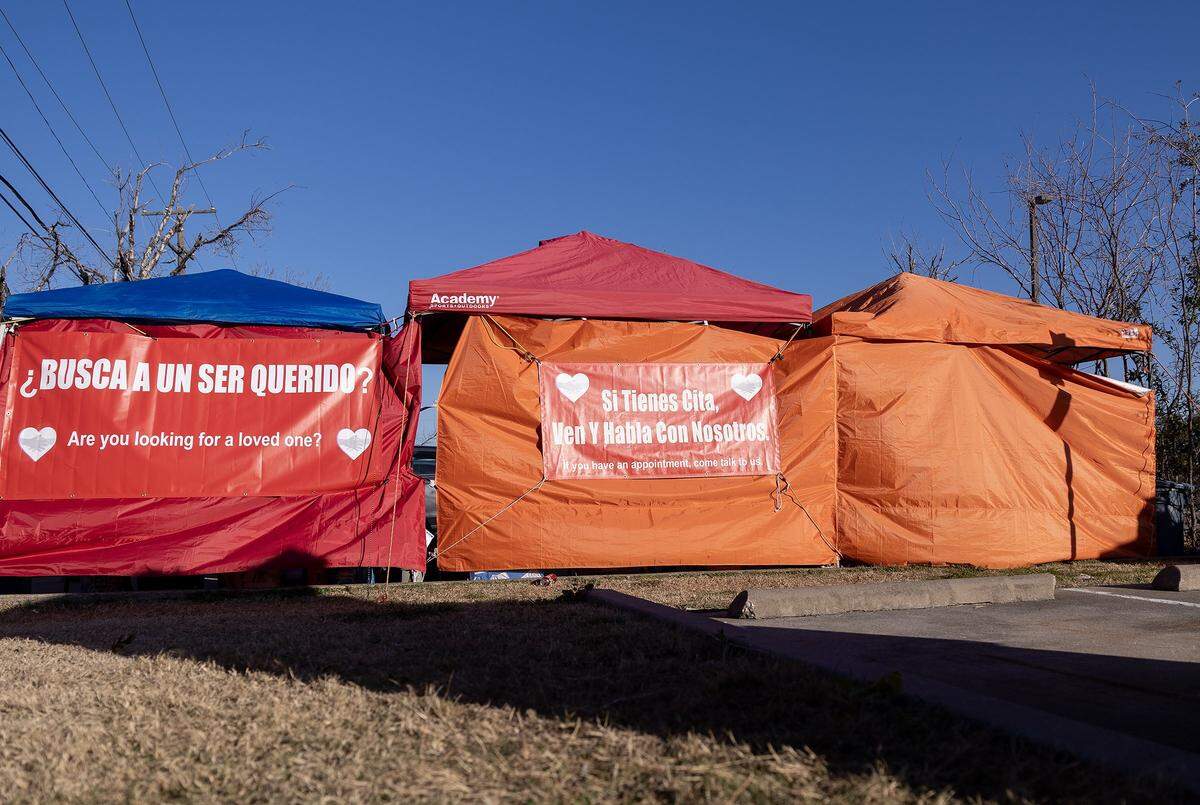 Volunteer created a respite center of tents outside of the U.S. Immigration and Customs Enforcement facility in Dallas that provides privacy waivers, food, toys for children and advice for those with appointments.