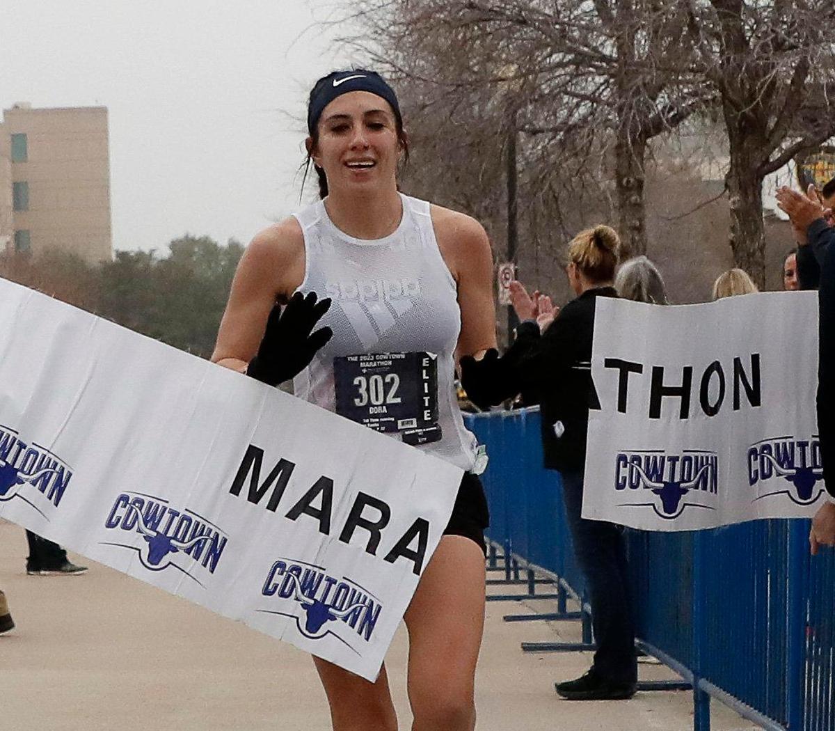 Dora Eastin took home first in the women’s marathon with a time of 2:52.24 during the 2023 Cowtown Marathon in Fort Worth, Texas, Sunday, Feb. 26, 2023. Almost 21,000 runners registered for the two day event. (Special to the Star-Telegram Bob Booth)