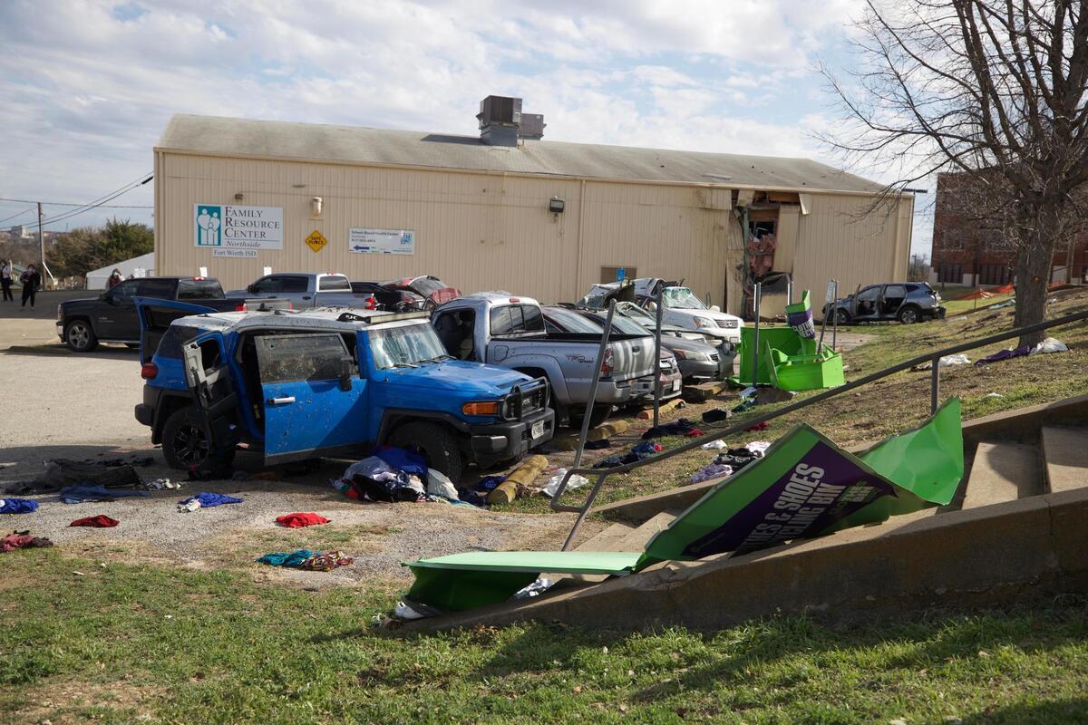 A car crashed into other vehicles in a parking lot and then into a building at JP Elder Middle School on March 1, 2021, in Fort Worth.