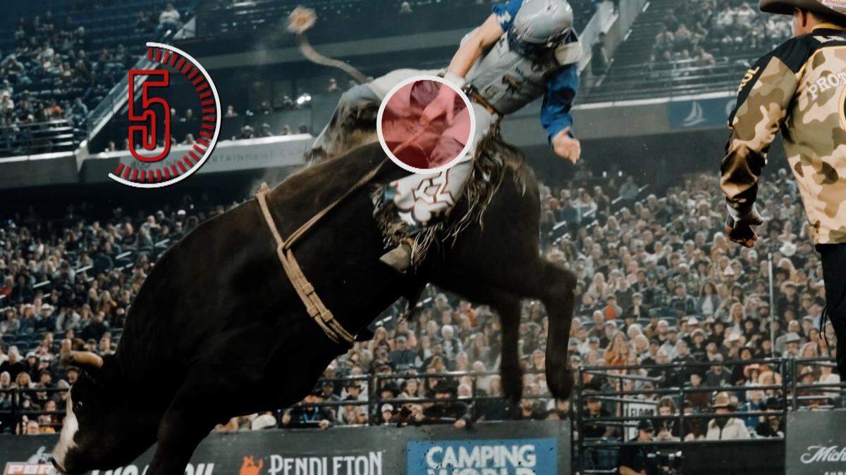 A rider at five seconds on a bull.