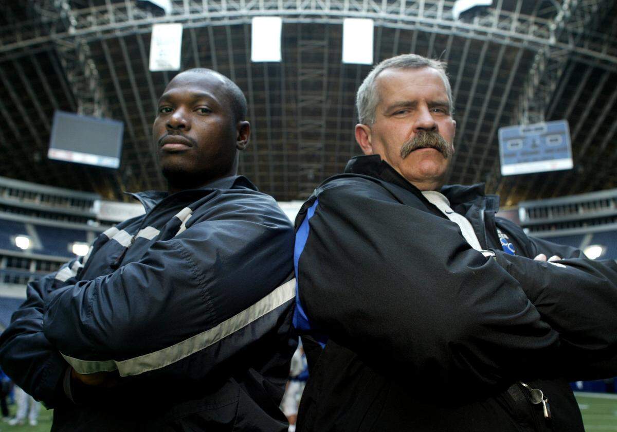 FOR NE SPORTS STORY **DIGITAL IMAGE** North Crowley football Defensive coordinator Eugene Rogers (cq), left, and head coach Mike Papas (cq) during the team practice at Texas Stadium in Irving on Wednesday, December 3, 2003. (M.L. GRAY/Star-Telegram)