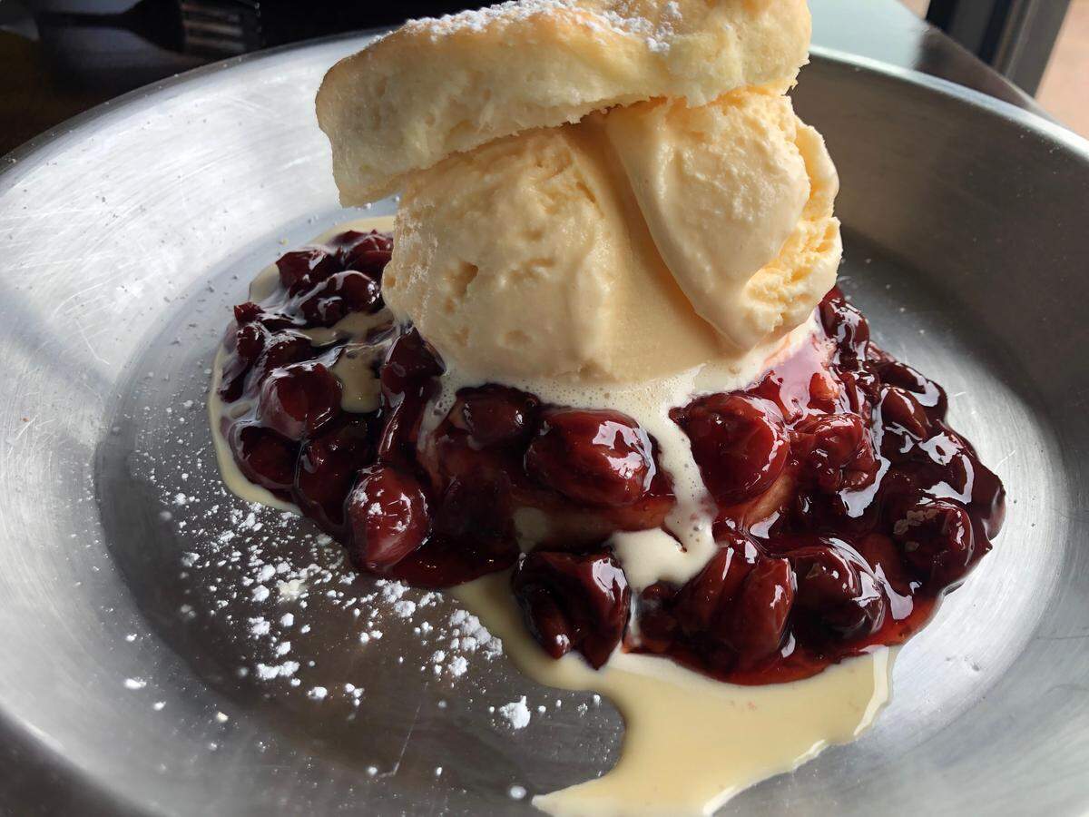 A cherry-pie biscuit with vanilla ice cream at Ben’s Triple B.