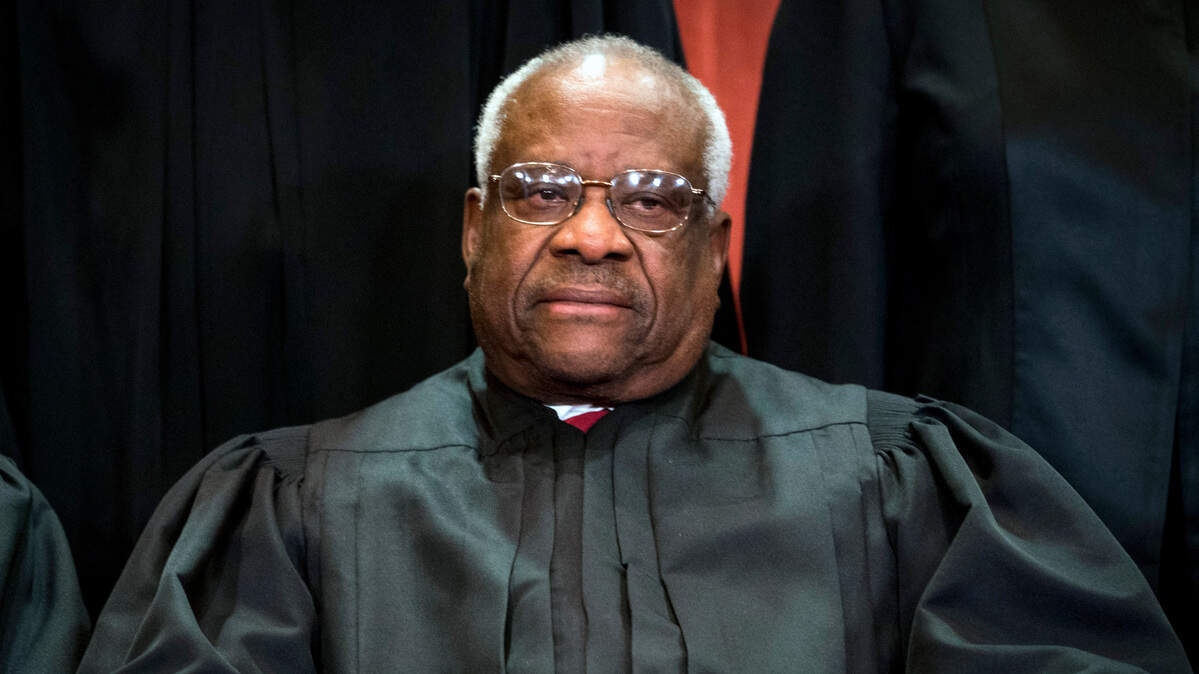 FILE -- Associate Justice Clarence Thomas joins the rest of the Supreme Court justices in sitting for a group photo in Washington on Nov. 30, 2018. Thomas on Tuesday, Feb. 19, 2019, called for the Supreme Court to reconsider New York Times v. Sullivan, the landmark 1964 ruling interpreting the First Amendment to make it hard for public officials to prevail in libel suits. (Doug Mills/The New York Times)