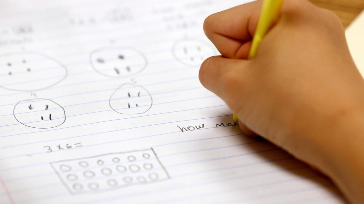 A child works on a math problem during a summer learning program at Rufino Mendoza Elementary School on Wednesday, June 12, 2024, in Fort Worth.