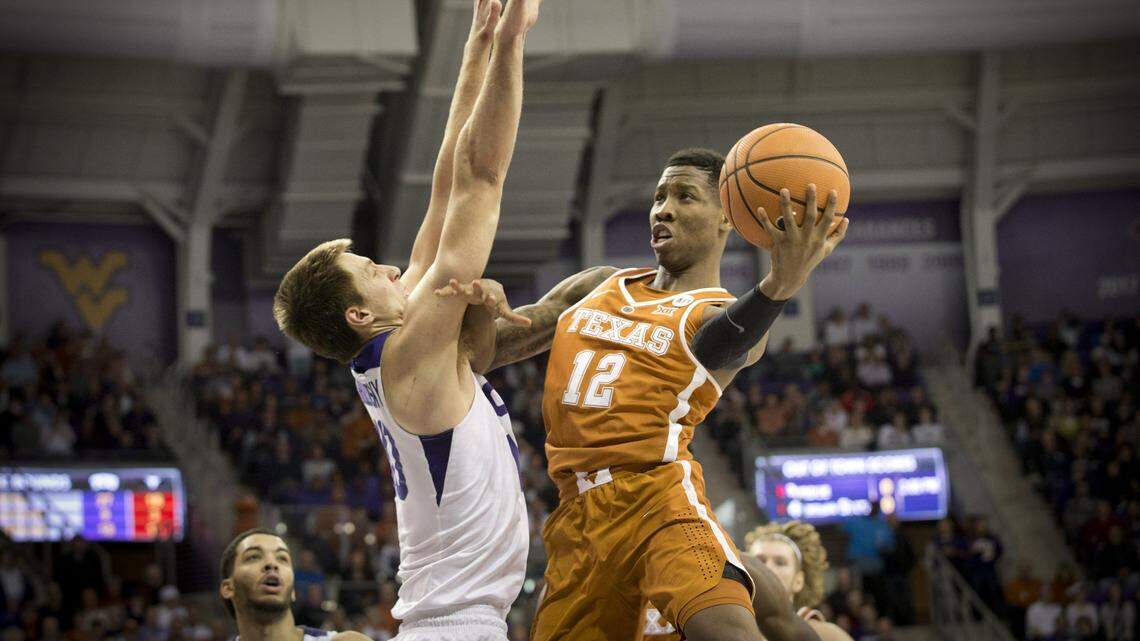 Texas' Kerwin Roach II shoots against TCU's Vladimir Brodziansky on Feb. 10.