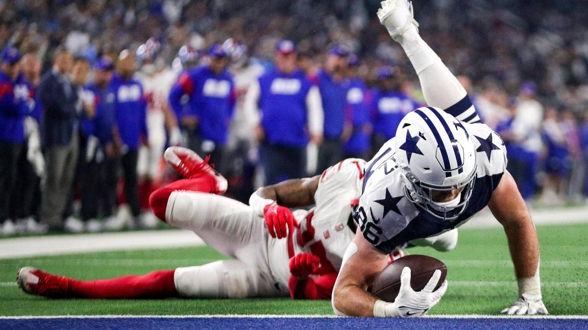Dallas Cowboys tight end Dalton Schultz dives into the end zone to score a touch down during their game against the Giants at the AT&T Stadium in Arlington on Thursday, Nov. 24, 2022. The Cowboys defeated the Giants 28-20 on Thanksgiving.