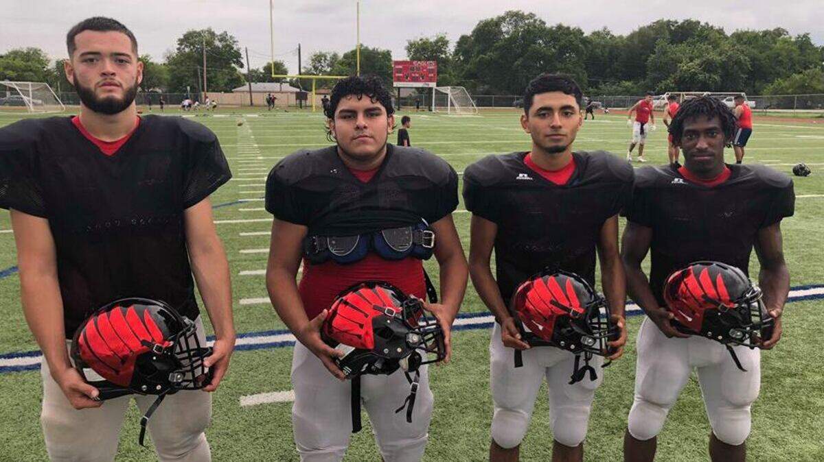 Diamond Hill-Jarvis seniors from left to right: QB Adrian Gutierrez, DL/OL Daniel Robles, LB Joey Flores and RB Eddrick Hampton.
