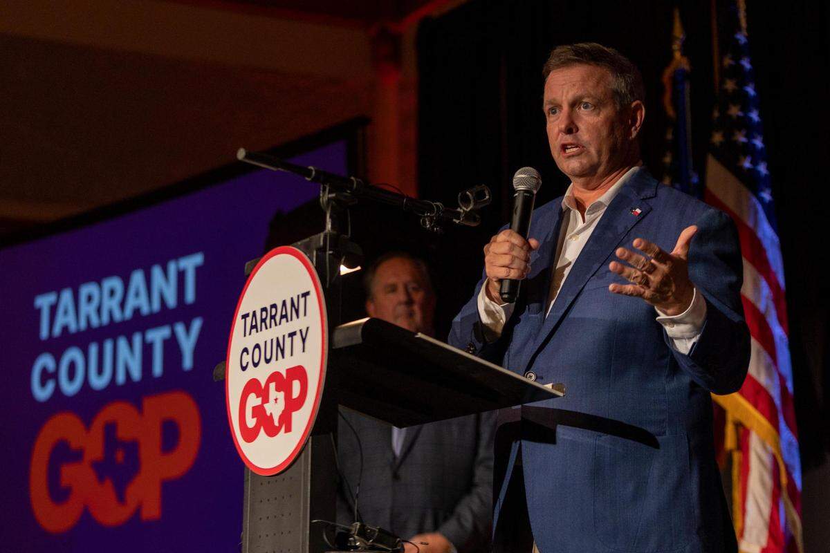 Tim O’Hare speaks at the Tarrant County GOP watch party on Tuesday at the Ashton Depot in Fort Worth. O’Hare currently leads the race for County Judge against Deborah Peoples.