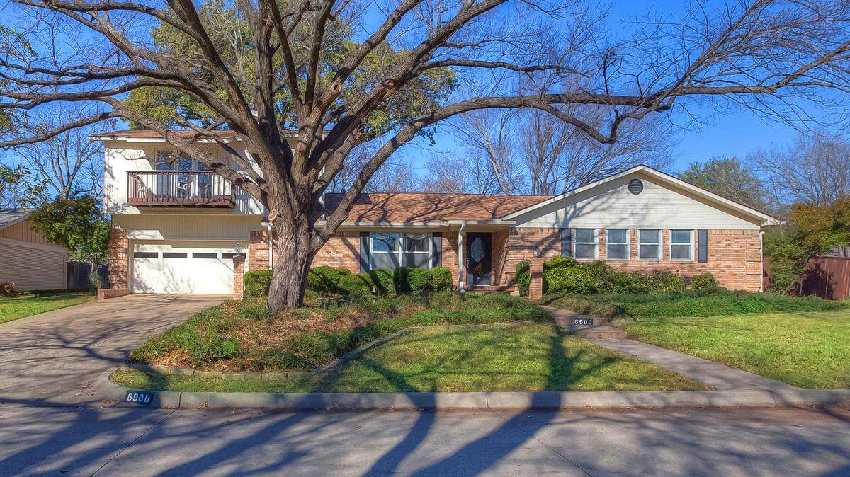 The home at 6900 Bal Lake Drive sits on a large lot.