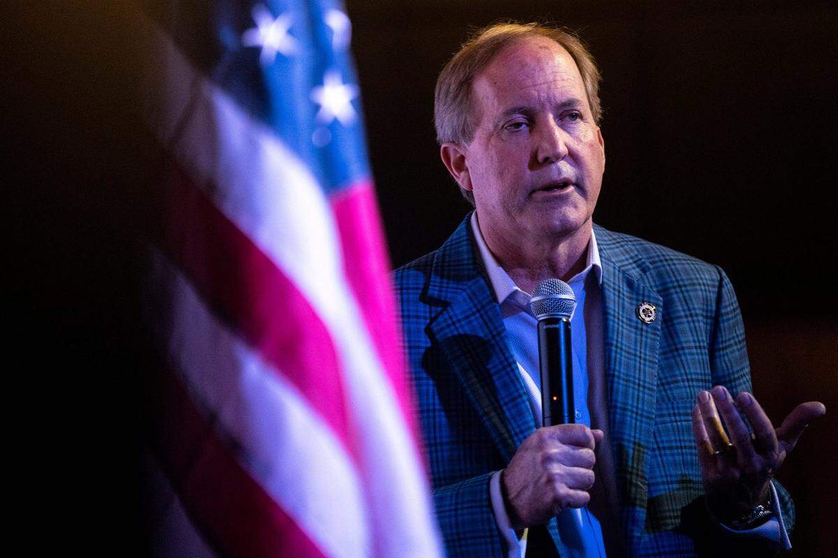 Attorney General Ken Paxton speaks to supporters as he supports Tom Glass in his campaign for Texas House in Jan. 2024 in Bastrop.