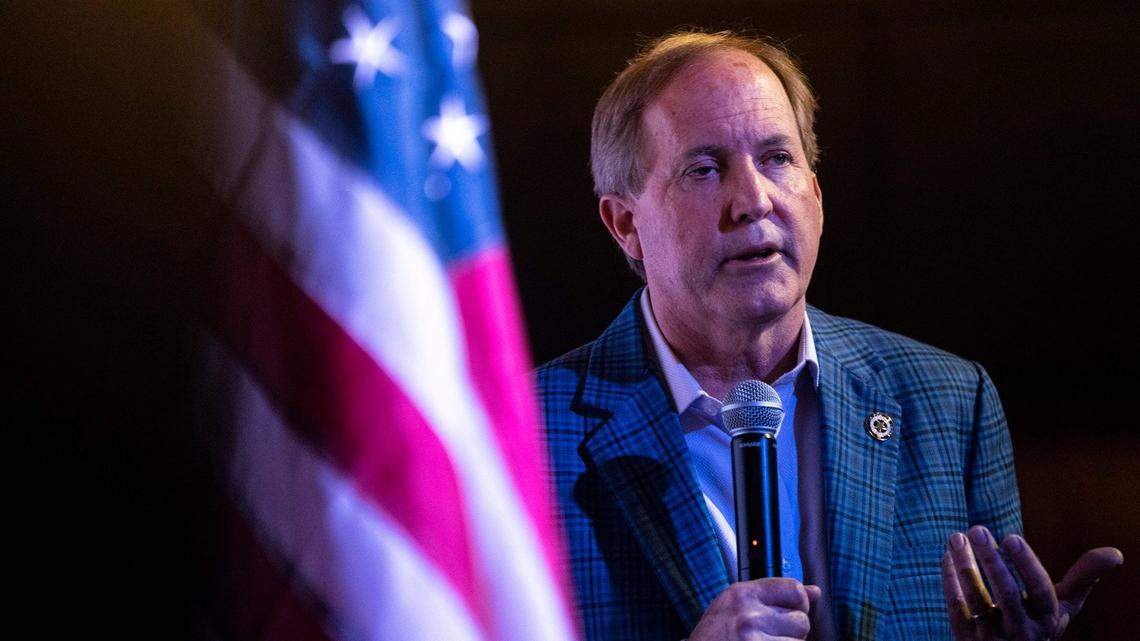 Attorney General Ken Paxton speaks to supporters as he supports Tom Glass in his campaign for Texas State Representative District 17 at Film Alley in Bastrop on Wednesday, Jan. 24, 2024.