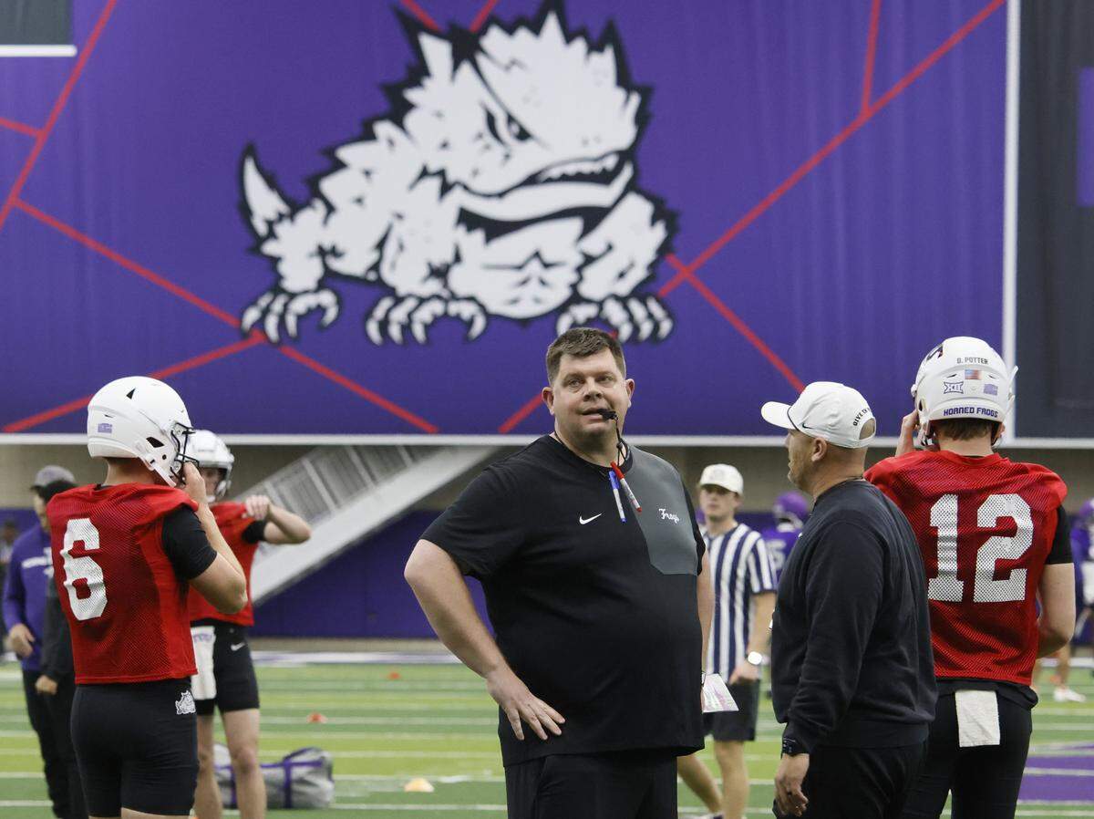 TCU offensive coordinator Gordon Sammis watches practice during the first day of Spring football practice at TCU in Fort Worth, Texas, Tuesday, March, 24, 2026.