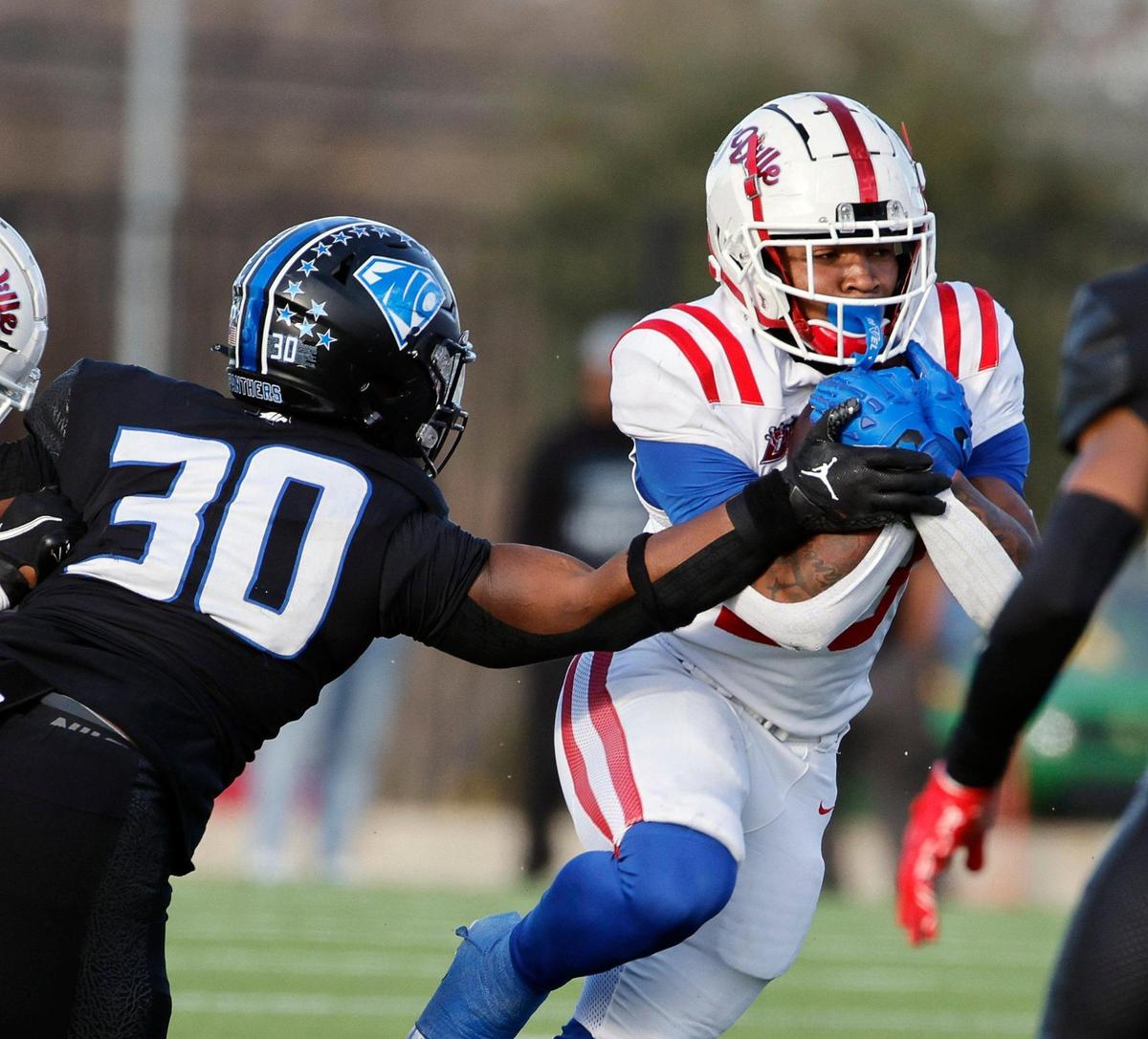 Duncanville running back Caden Durham (29) breaks it through a hole in the middle during the first half of a UIL Conference 6A Division I state semifinal football playoff game at Mesquite Memorial Stadium in Mesquite, Texas, Saturday, Dec. 09, 2023. Duncanville led North Crowley 24-0 at the half.